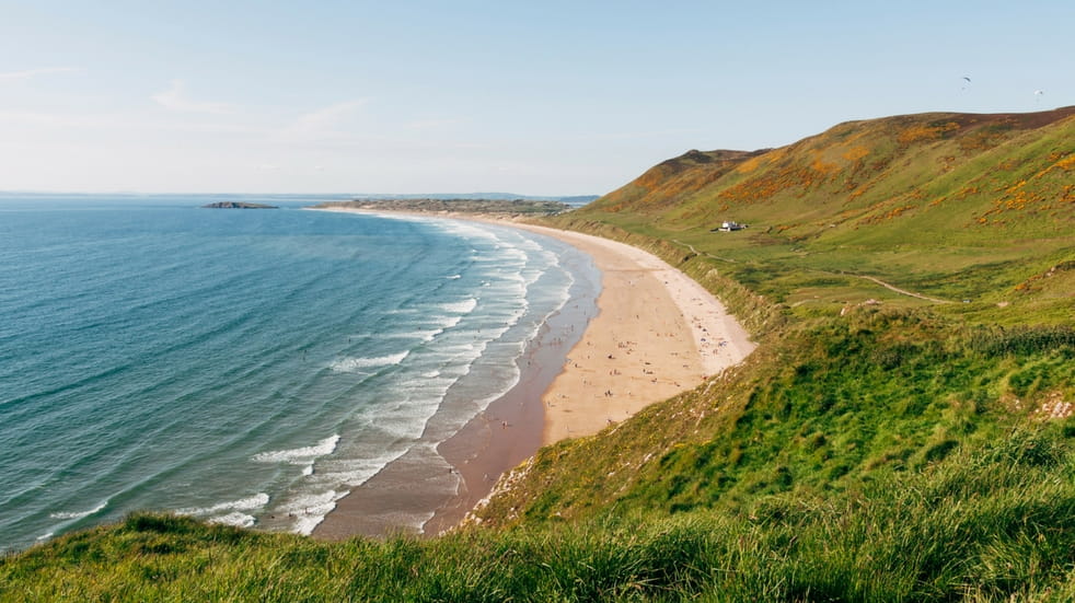 Staycation vs vacation Rhossilli Bay Wales